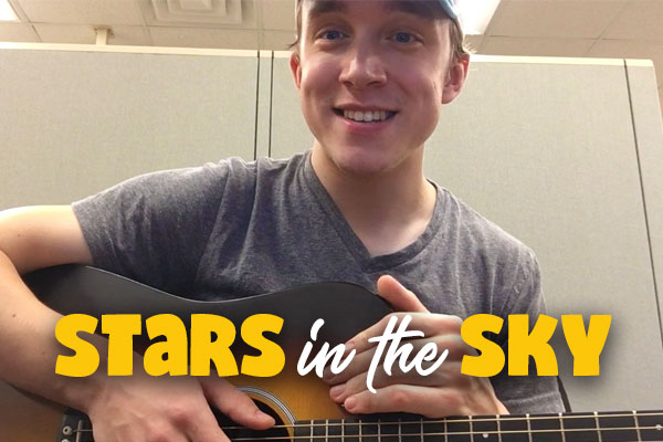"Stars in the Sky"- counselor with guitar