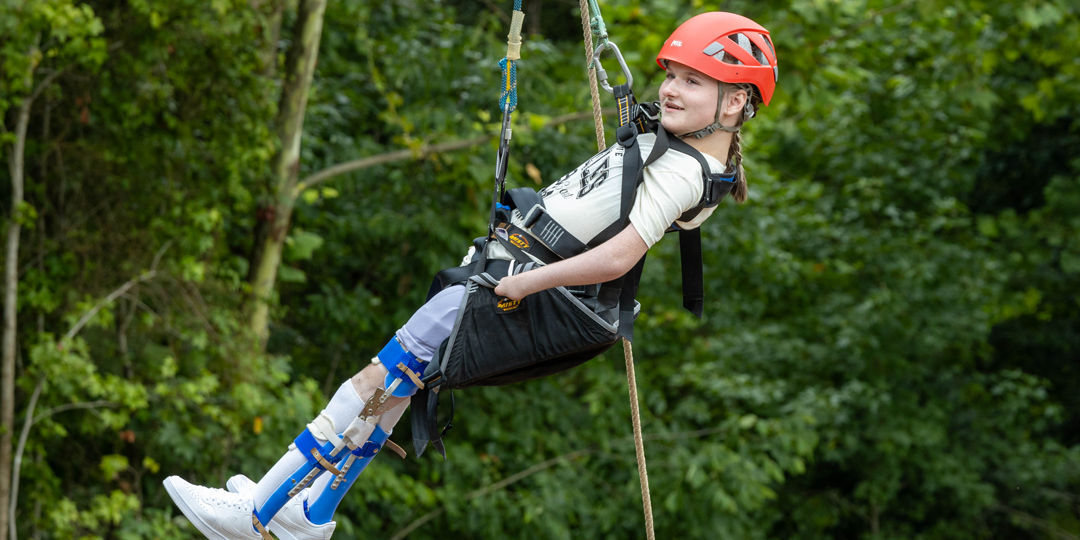 Camper on pendulum swing.